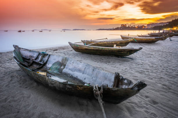 istock Boat on the beach with sunset 855965810
