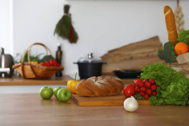 istock Kitchen interiors. Many vegetables and other meal are ready for been cooked soon 855967064