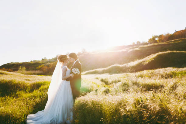 istock Wedding couple on a walk in nature 855970020