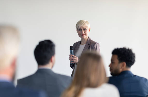 istock Female business presenter 855970274