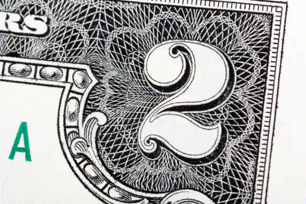 istock Macro of the number two on a two dollar bill 855973662