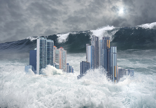 Apocalyptic scene of modern city's skyscrapers submerged by tsunami with a giant second wave coming