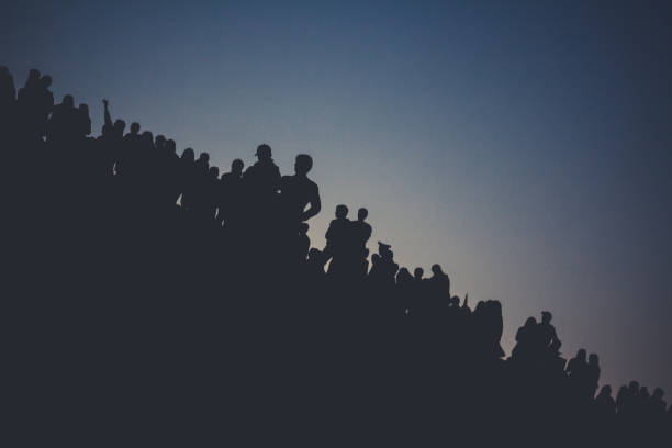 istock Silhouettes of people on the mountain 855977132