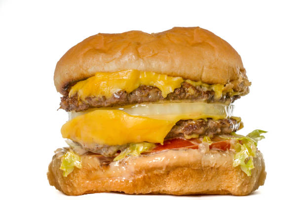 istock Fast food culture concept image - uneaten burger 855977140