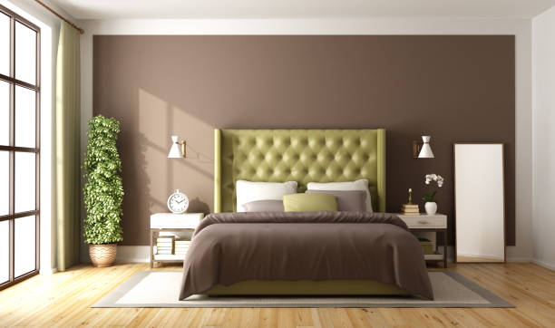 istock Brown and green master bedroom 855980178