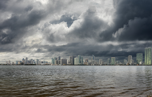 Miami skyline with moody sky.