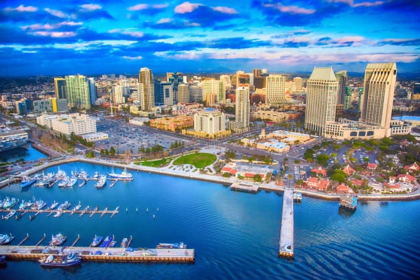 Downtown San Diego Skyline Aerial The downtown district of San Diego, California shot after a storm at sunset from an altitude of approximately 300 feet during a helicopter photo flight. marina california stock pictures, royalty-free photos & images