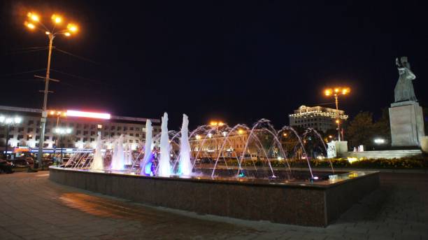 istock The fountain, lit by multicolored lights. 855990992