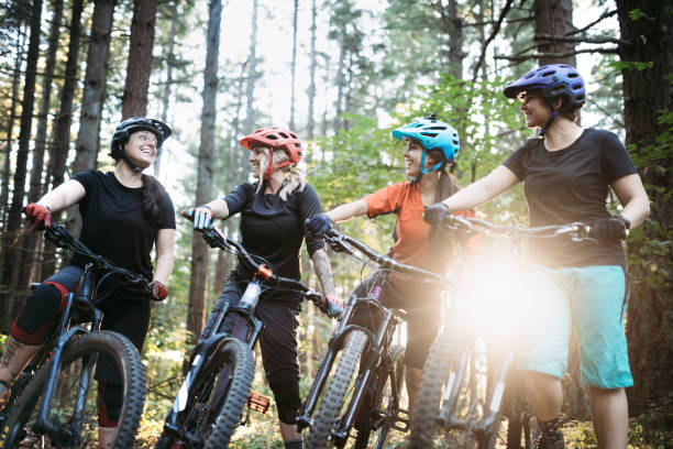 istock Women Mountain Biking Team 855996918