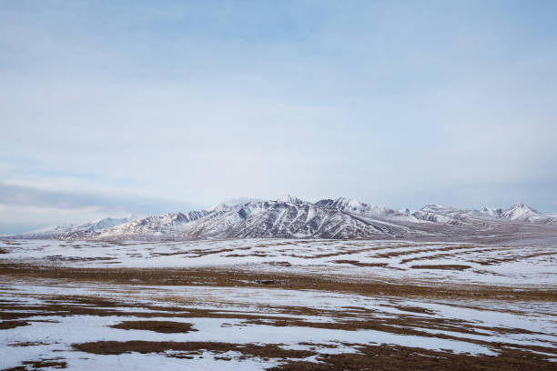 istock country road and hills with white snow 855997668