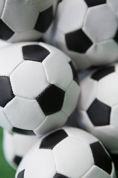 istock Stacked football soccer balls 856004562