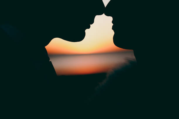 istock Groom and bride on a walk outdoors at the sea 856006756