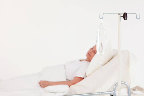istock Elderly woman lying in a hospital bed 856007762