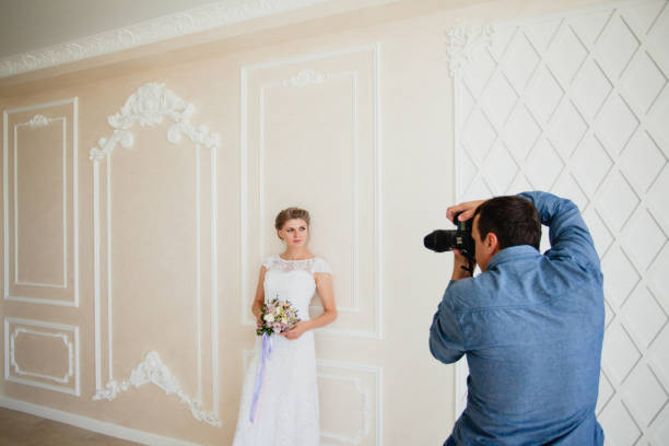 istock Photographer taking pictures the bride 856010458