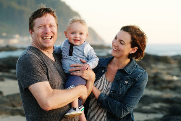 istock Family with Baby Having Fun Outdoors 856014252