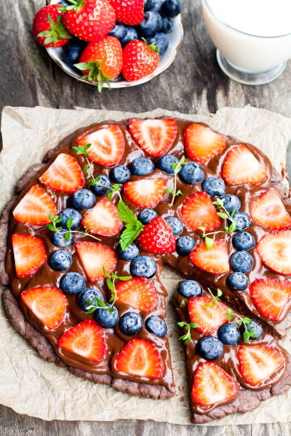 istock Homemade  chocolate natural fruit pizza with berries 856014300