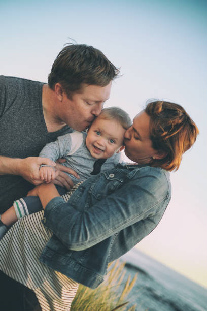 istock Family with Baby Having Fun Outdoors 856014588