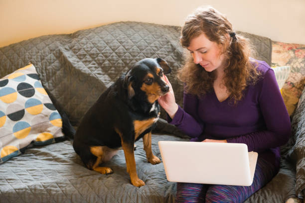 istock Atlanta Woman in 30s Working on Laptop Computer at Home 856014596
