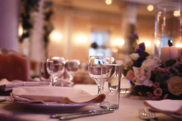 istock Glass wine glasses on the table served in the restaurant 856017524