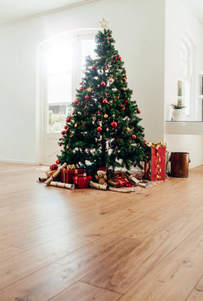 istock Christmas celebrations with beautifully decorated Christmas tree at home. 856020908