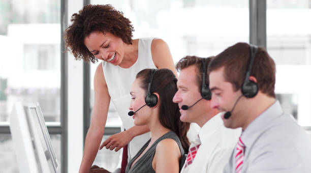 istock Delighted female manager with her sale representative team 856035380