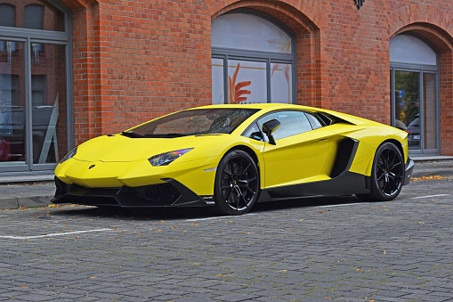 Cologne, Germany: Mar 19th 2022: A Lamborghini sports car parked downtown Cologne on a bright spring day.