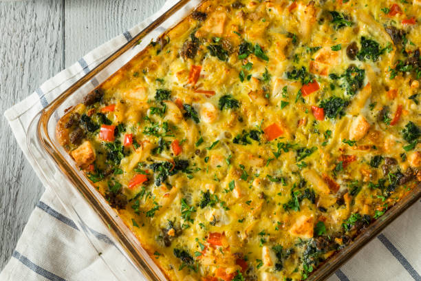 Homemade Baked Egg Casserole Homemade Baked Egg Casserole with Potatoes and Sausage casserole stock pictures, royalty-free photos & images