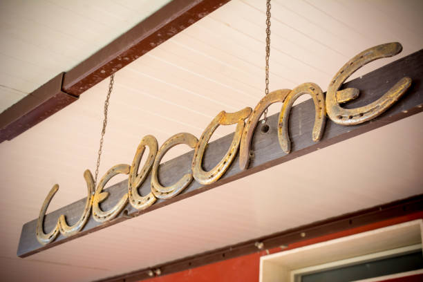 istock welcome signboard made by horsehoes 856039368
