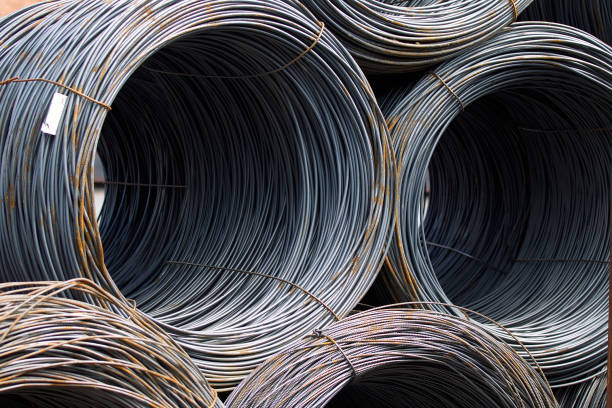 istock Thin metal reinforcement wound into bays at the metal products warehouse 856048708