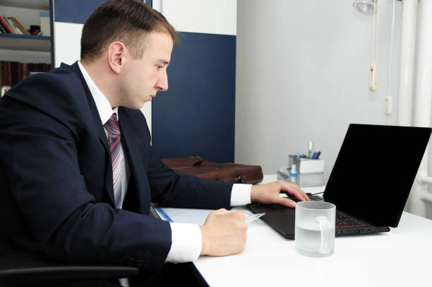 istock Young man working at home , business home office 856049400