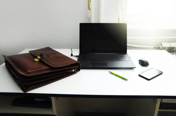 istock laptop bag and mobile phone , pen 856053756