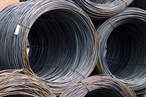 istock Thin metal reinforcement wound into bays at the metal products warehouse 856053776