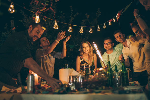 istock Group of friends having fun at backyard birthday party 856076816