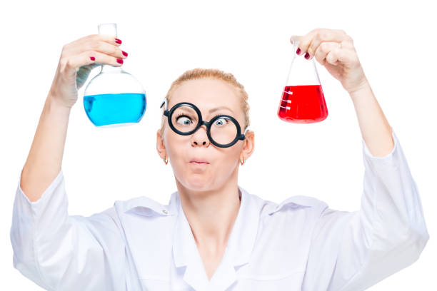 istock portrait of a mad lab technician with two flasks of colored substances on a white background 856083370