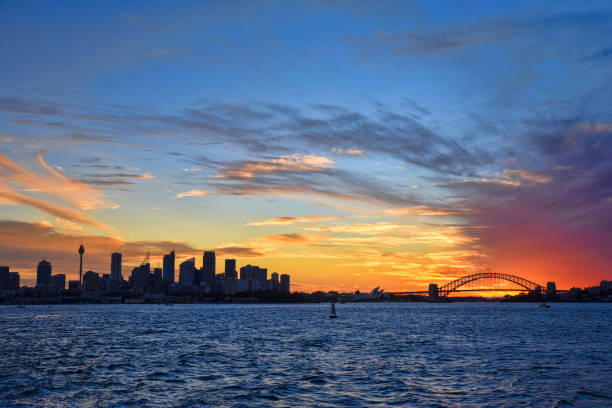 istock Colourful sunset over Sydney bay with city and Harbor bridge 856087206