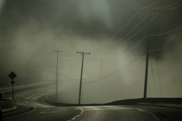 Misty Highway Early morning mist on the Trans Canada Highway. shadow british columbia landscape cloudscape stock pictures, royalty-free photos & images