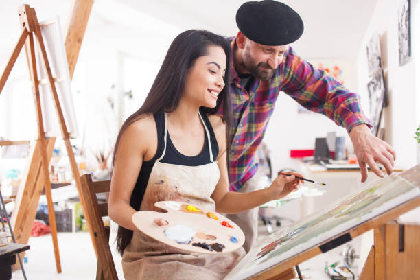 istock Student and teacher working in atelier 856090880