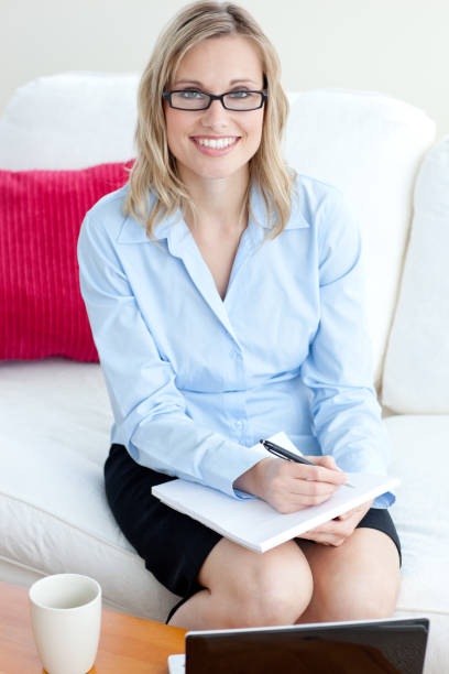 istock Attractive businesswoman smiling at the camera 856093802