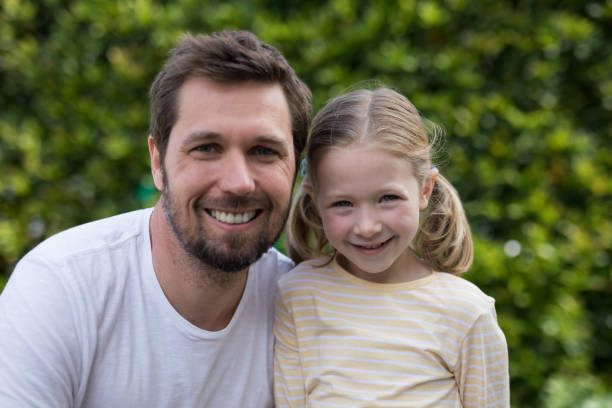 istock Father and daughter in the park 856094018