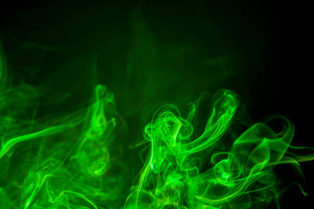 istock Green smoke motion on black background. 856094960