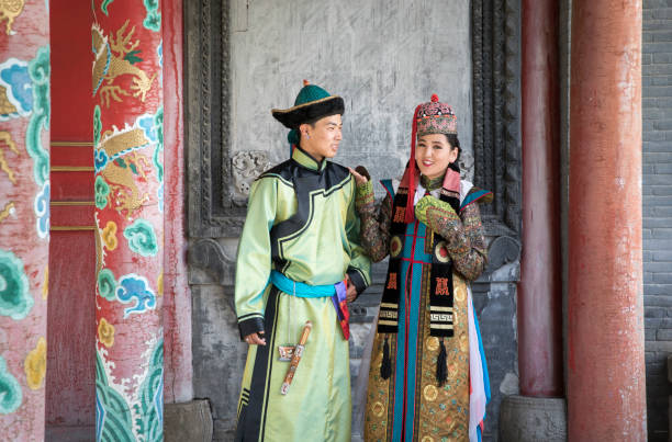 istock mongolian couple in traditional outfit 856097420