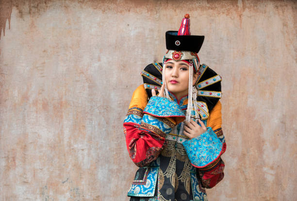 istock Mongolian woman in traditional outfit 856097444