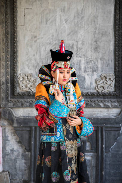 istock Mongolian woman in traditional outfit 856097454