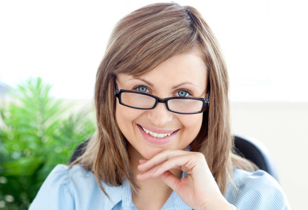 istock Attractive woman sitting on a chair 856100898