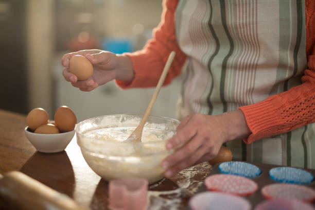 istock Woman preparing cookies in kitchen 856101810