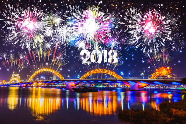 istock Cheerful fireworks display in city night and bridge 856123162