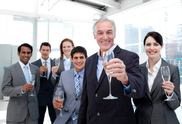 happy diverse business group toasting with champagne - party business toast champagne imagens e fotografias de stock