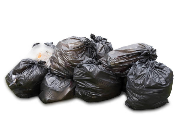 istock Black garbage bags isolated on white background with shadow on floor, Concept for save environment and earth 856133622