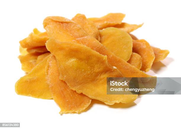 Dried Mango In A White Background Stock Photo - Download Image Now - Dried Food, Mango Fruit, Dry