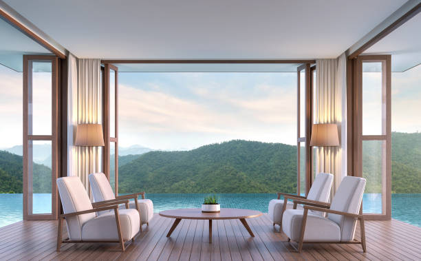 Pool villa living room with mountain view 3d rendering image Pool villa living room with mountain view 3d rendering image.The living room floats above the pool. Inside is a wooden floor the doors are open on all sides. Touch nature closely. hotel window view stock pictures, royalty-free photos & images